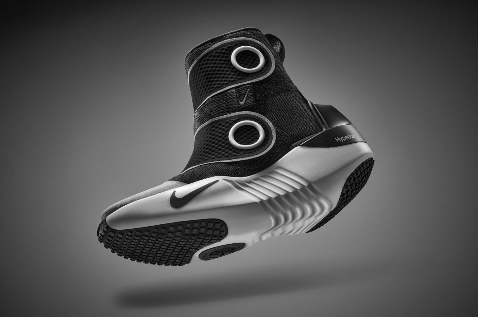 (Credit: Nike) New Nike x Hyperice massage boots - black high-tops with a white sole.